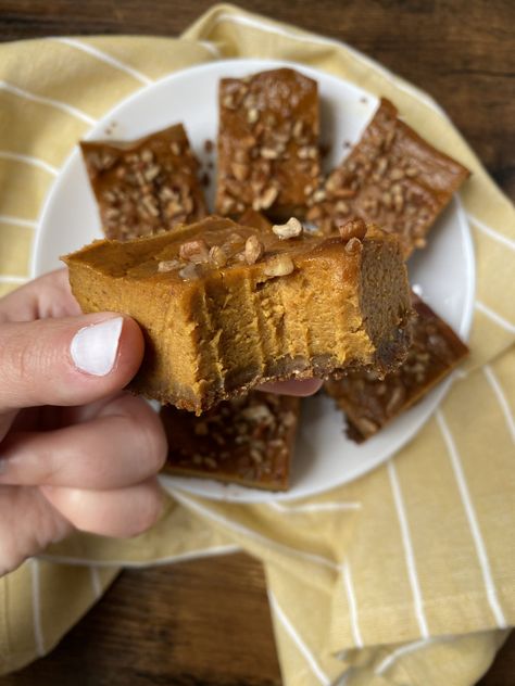 These bars have a smooth, creamy pumpkin filling on a sweet, zingy gingersnap crust - a fall fave! Gingersnap Crust Pumpkin Pie, Gingersnap Crust Recipes, Pumpkin Pie Cheesecake Bars, Swirled Cheesecake, Pumpkin Cream Cheese Bars, Cream Cheese Bars, Pumpkin Cheesecake Bars, Small Batch Baking, Thanksgiving Pumpkin Pie