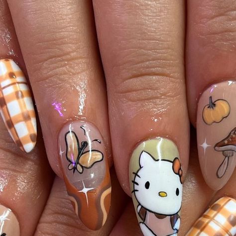 Chelsey Downie 🦋 LUXURY, Y2K NAIL ARTIST - LINCOLN 🇬🇧 on Instagram: "Hello Kitty (Autumn Version) 🍂
ITS TIME TO GET YOUR PUMPKIN SPICE LATTE AND BLANKETS READY! I am SO excited for summer to be overrrrrr! Autumn cosy vibes can’t come quick enough! 😭🤎🧡💛 
•
#hellokittynails #autumnalhellokitty #autumnhellokitty #autumnnails #autumnalnails #fallnails" Hello Kitty Thanksgiving Nails, Hello Kitty Thanksgiving, Y2k Nail, Excited For Summer, Cosy Vibes, Hello Kitty Nails, Y2k Nails, Thanksgiving Nails, Pumpkin Spice Latte