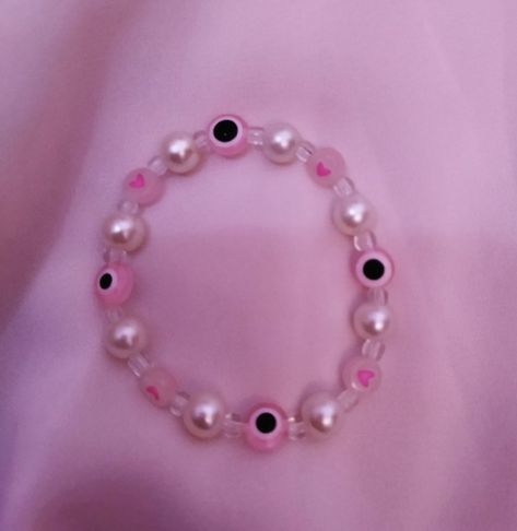 Pink Evil Eye Necklace, Pink Evil Eye Bracelets, Pink Evil Eye Beaded Bracelet, Bracelet Ideas Evil Eye, Pink Evil Eye Wallpaper, Evil Eye Bracelet Ideas, Latina Clothes, Pink Evil Eye, Preppy Bracelets