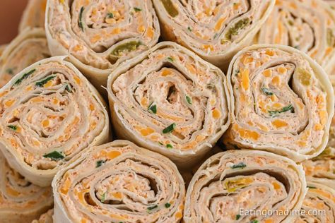 Tortilla Roll Ups - Eating on a Dime Tortilla Roll Ups Appetizers, Pinwheel Appetizers Cream Cheese, Tortilla Pinwheel Appetizers, Quick Party Food, Tortilla Pinwheels Recipe, Bite Size Appetizers Easy, Feast Ideas, Baked Appetizers, Tortilla Pinwheels