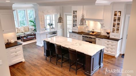 Classic Marble Island with Contrasting Granite Countertops Contrasting Island Countertop, Contrasting Kitchen, Contrasting Kitchen Island, Dark Island, Countertops Marble, Kitchen Dark, Island Countertop, Rustic Floor, The Riddle