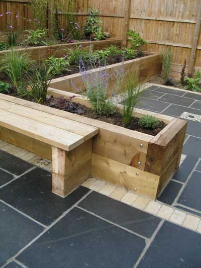 Planters Made From Sleepers, Plant Boxes Outdoor Garden Ideas, Sleepers Garden Ideas Landscape Design, Sleeper Planter Ideas, Plant Box Outdoor Garden Ideas, Garden Raised Border Ideas, Plant Boxes Outdoor, Garden Sleeper Ideas, Raised Flower Beds Along Fence