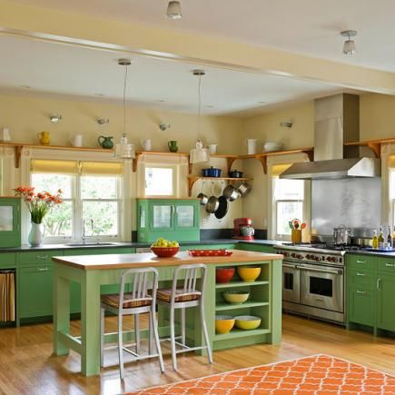 20 Kitchen Island Design Ideas | Midwest Living Kitchen Island Storage, Kitchen Ikea, Warm Kitchen, Kitchen Island Table, Farmhouse Kitchen Island, Kitchen Island With Seating, Green Cabinets, Island With Seating, Yellow Kitchen