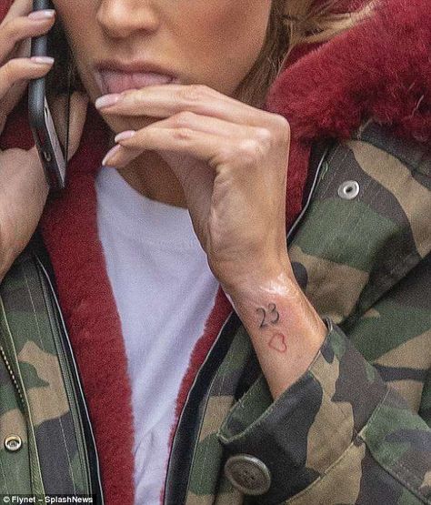 Olivia Attwood unveils tattoo tribute to footballer ex Bradley Dack | Daily Mail Online 22 Tattoo, Cupid Tattoo, Small Girly Tattoos, Tribute Tattoos, M Tattoos, Number Tattoos, Hand And Finger Tattoos, 13 Tattoos, Leo Tattoos