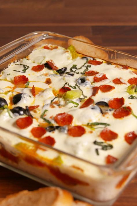 Pizza Seven Layer Dip  - Delish.com 7 Layer Dip Easy, 7 Layer Dip Recipe, Super Bowl Ideas, Layered Dip Recipes, 7 Layer Dip, Party Pizza, Seven Layer Dip, Dip Easy, Pizza Dip