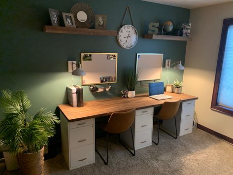 using three standard filing cabinets, an 8 foot butcher block countertop and personalized accessories we created a his and hers space as a redesign. Sherwin Wiliams color is Rocky River, accessories from TJ Maxx and Amazon. Three Monitor Desk Setup Office, Home Office His And Hers, Home Office Three Monitors, His And Hers Desk, Home Office Desk Multiple Monitors, Double Desk Home Office Green, Butcher Block T Desk, His And Hers Office, Den Ideas