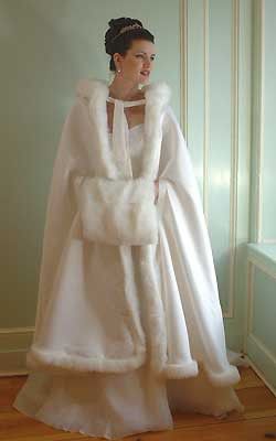 Every winter bride needs a fur-lined cape. Winter Wedding Dress Accessories, Winter Wedding Cape, David Thomas, Winter Wedding Planning, Bridal Coat, Wedding Cloak, White Winter Wedding, Wedding Cape, Bridal Wrap