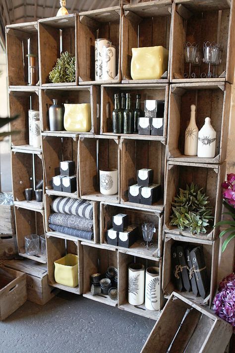 DIY Wine Crate Storage Projects | Decorating Your Small Space Crate Display Ideas, Wine Crate Wall, Wine Crate Storage, Charity Shop Display Ideas, Crate Wall, Crate Display, Crate Crafts, Old Wooden Crates, Miller House