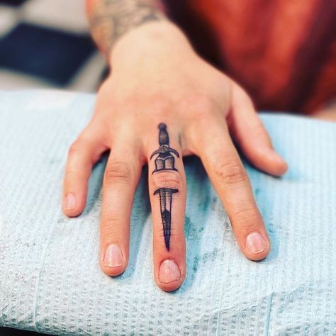 Knife Tattoo On Finger, Finger Knife Tattoo, Knife Finger Tattoo, Dagger Hand Tattoo, Dagger Finger Tattoo, Daggar Tattoo, Sleeve Filler Ideas, Tattoo Background Filler, Tattoo Sleeve Filler Ideas