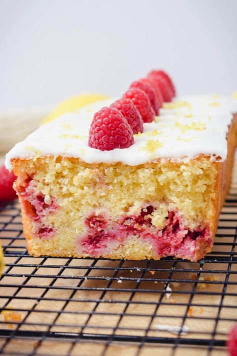 A moist lemon pound cake loaf studded with real raspberries. Top with a lemon glaze icing and fresh raspberries. Lemon Raspberry Loaf, Raspberry Lemon Loaf, Raspberry Loaf Cake, Lemon Glaze Icing, Raspberry Loaf, Moist Lemon Pound Cake, Lemon Raspberry Cake, Dirt Cake Recipes, Raspberry Lemon Cakes