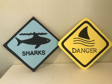 Shark sign Shark Board Ideas, Beware Of Sharks Sign, Shark Door Decoration, Jaws Boat, Shark Diy, Shark Decorations, Shark Clothes, Shark Sign, Shark Room