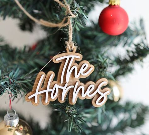 Laser Cut Christmas Ideas Wooden Name Ornaments, Mdf Christmas Ornaments, Last Name Ornaments, Christmas Ornament Personalized, Personalized Wood Ornaments, Cricut Wood Ornaments, Glowforge Projects Ideas To Sell, Cricut Wood Cutouts, Laser Ornaments Christmas