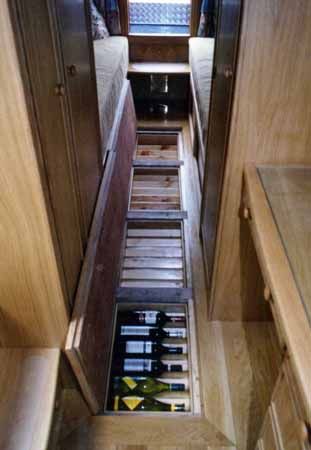 Wine storage for your RV - Wish I had this right now if just for an additional layer of insulation on the floor. Check out the website to see more Trailer Storage, Floor Storage, Rv Organization, Vw Lt, Camper Storage, Rv Storage, Camper Life, Remodeled Campers, Vintage Trailers