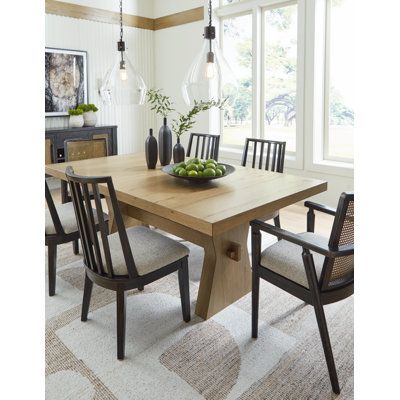 This dining table expertly refines the raw beauty of wood, bringing a rustic vibe to urban contemporary design. It creates an organically beautiful feel in your dining room—an extra-thick tabletop spotlights the unique, natural details of the wood. And the stunning simplicity of the materials allows you to seamlessly coordinate this table with your existing decor. Loon Peak® | Loon Peak® Biseye Dining Table 29.75 H x 78.0 W x 44.0 D in brownWood | 29.75" H X 44" W X 78" L | Wayfair Rustic Dining Room Decor Ideas, Light Brown Dining Table, Dining Room Table Ideas, Organic Modern Dining Room, Contemporary Dining Room Design, Brown Dining Table, Wood Dining Room, Urban Contemporary, Dining Room Table Set