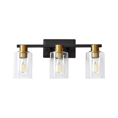 Features:Exquisite Design：The bathroom vanity light fixture is made of strong metal, moisture-proof and rust-proof performance, matt black finish and golden E26 base decoration, retro and beautiful. With clear glass shades, they can protect the bulbs and have a modern style.?Vanity Light?The bathroom vanity light fixture is made of strong metal, moisture-proof and rust-proof performance, matt black finish and golden E26 base decoration, retro and beautiful. With clear glass shades, they can prot Black Bathroom Vanity Light, Black Bathroom Vanity, Brass Vanity Light, Modern Vanity Lighting, Black Vanity Bathroom, Black Vanity Light, Light Fixtures Bathroom Vanity, Black Vanity, Vanity Light Fixtures