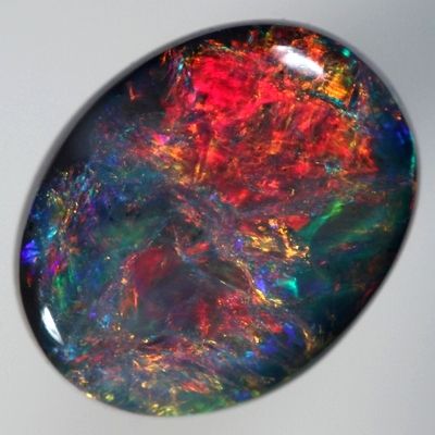 SOLID BLACK OPAL Top quality opal exploding with red. With VIDEO | AussieTreasureChest.com.au Black Gemstones, Black Pinterest, Winter Boho, Pretty Rocks, Summer Street, Beautiful Rocks, Spring Jewelry, Lightning Ridge, Mineral Stone