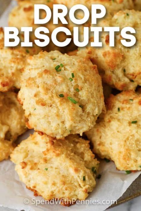 These super fluffy homemade drop biscuits are so easy to make and use just one bowl. Ready in 20 minutes, they are the best baking powder biscuits ever! #spendwithpennies #dropbiscuits #sidedish #recipe #easy #homemade #garlic #fluffy #parmesan #bisquick #best Garlic Drop Biscuits, Recipe For Chicken And Dumplings, Cheddar Drop Biscuits, Serve With Soup, Garlic Biscuits, Easy Drop Biscuits, Easy Holiday Side Dishes, Drop Biscuits Recipe, Baking Powder Biscuits