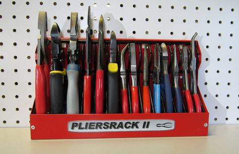 Pliers are tricky things to store. They don't lend themselves to pegboad, as wedging them into a hook by their crotches is defeated by simple gravity. If you obey gravity and store them flat in a drawer, their awkward splay-handled shape takes up an undue amount of space, and they Garage Hacks, Socket Organizer, Garage Tool Organization, Magnetic Tools, Tool Box Organization, Tool Rack, Tool Organizers, Learn Woodworking, Garage Tools