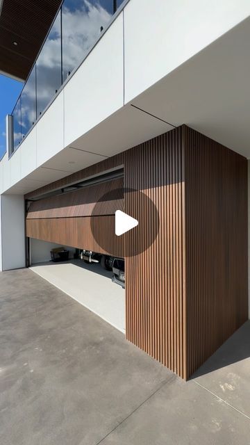 TOWER GARAGE DOORS AUSTRALIA on Instagram: "Discover elegance!   in simplicity with our flush mount door, expertly clad in @newtechwoodaustralia cladding. It’s not just a door—it’s the gateway to a home that speaks volumes about style and sophistication." Concealed Garage Door, Modern Wood Garage Door, Garage Exterior Ideas, Modern Garage Doors Ideas, External Garage, Modern Garage Ideas, Garage Cladding, Garage Doors Modern, Garage Doors Ideas