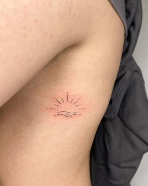 Embracing the Waves: 19 Simplistic Wave Tattoo Ideas for 2024 - besttattoo.wiki - Unveiling Exquisite Ink Art Simple Wave Tattoo, Sun Tattoo Small, Minimalist Tattoo Small, Rib Tattoos For Women, Sunset Tattoos, Wave Tattoo, Petite Tattoos, Парные Тату, Sun Tattoos