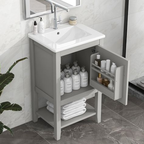 PRICES MAY VARY. [Stylish and Small Bathroom Vanity]: This single bathroom vanity has stylish lines and eye-catching gold handles, making it suitable for any decoration style. The compact size and various functionality are the perfect solution for a small apartment or guest room. [Solid Wood Bathroom Cabinet]:Practicality and durability is important to bathroom facilities, so we use real wood and MDF boards for this product, which not only increases the product stability but also ensures a long- 20 Inch Bathroom Vanity, Modern Bathroom Cabinets, Bathroom Vanity With Sink, Vanity With Sink, Modern Sink, Small Bathroom Vanities, Bathroom Vanity Base, Small Bath, Sink Top