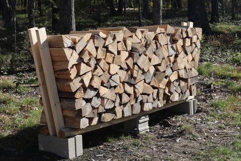 Cinder Block Firewood Rack - DIY Using No Tools Firewood Cinderblock Storage, Cement Block Firewood Holder, Cinder Block Firewood Rack, Campfire Wood Storage Diy, Diy Wood Stacking Rack, Wood Fire Box Firewood Storage, How To Stack Firewood Outside, Stacking Wood Ideas, Stacking Firewood Outside Ideas