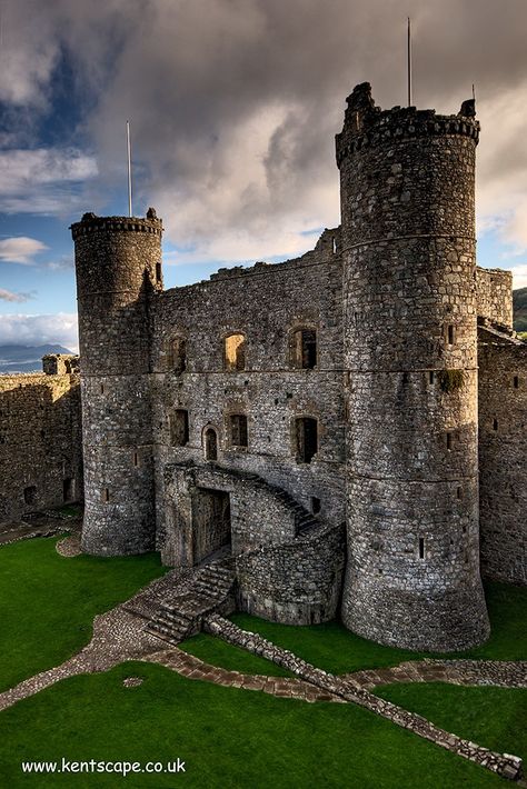 Harlech Castle, don't think I've ever seen a castle in such a stunning location! Spectacularly sited Harlech Castle seems to grow naturally from the rock on which it is perched. Like an all seeing sentinel, it gazes out across land and sea, keeping a watchful eye over Snowdonia. The English monarch Edward I built Harlech in the late 13th century to fulfil this very role. It was one of the most formidable of his 'iron ring' of fortresses designed to contain the Welsh in their mountain fastness Harlech Castle, English Monarchs, Watchful Eye, Wars Of The Roses, Land And Sea, Iron Ring, Snowdonia, All Seeing, A Castle