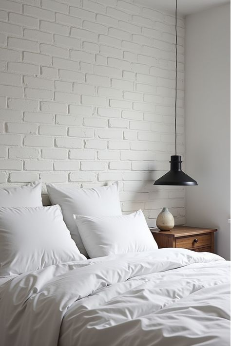 Scandinavian-style bedroom featuring white brick wall and black pendant White Brick Wall Bedroom, Unique Accent Wall Ideas, White Brick Accent Wall, Bedroom Accent Wall Ideas, Unique Accent Wall, Bedroom Accent Wall, Brick Accent Wall, Accent Wall Ideas, Paint Inspiration