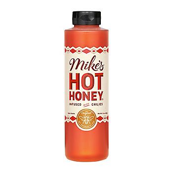 Mike's Hot Honey is a sweet-heat combo of honey infused with chili peppers that adds the perfect kick to just about any food or drink. Founded by Mike Kurtz in New York City in 2010, Mike's Hot Honey has grown via word-of-mouth sensation to become America's leading brand of hot honey. Use this spicy and sweet condiment in a variety of dishes.  Product Features:  * Sweet-heat combo of honey infused with chili peppers * Quick and easy way to add the perfect kick to your favorite foods * Drizzle it on pizza or wings, pair it with cheese, and add it to cocktails or tea * Made with 100% pure honey, real chili peppers, and vinegar * Certified Kosher * All natural, gluten-free * Contains no artificial sugar or preservatives * Easy pour bottle * Includes hot honey condiment, 24 oz.   Ingredients: Mikes Hot Honey, Cornbread Biscuits, Honey Label, Acacia Honey, Barbecue Ribs, Sweet Heat, Hot Honey, Honey Syrup, Vegan Sauces