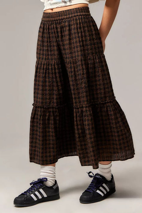 The Ceilia midi skirt feautres an all-over preppy check print. Cut from cotton FT, an elasticated regilar- rise waist, tiered silhouette and midid hem. Skirt Winter Outfit, Skirt With Boots, Skirt Tiered, Skirt Winter, Tailored Clothes, Tiered Midi Skirt, Brown Fits, Boho Skirt, Skirts With Boots