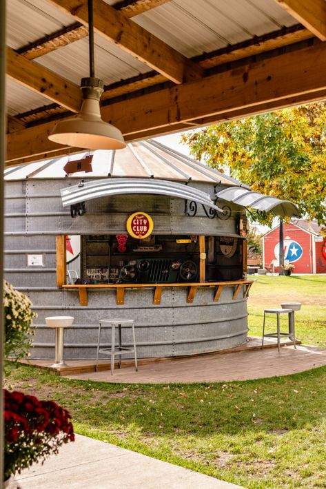 A beautifully decorated grain bin bar at Adler Ranch. Grain Bin Patio, Grain Bins Repurposed, Grain Bin Gazebo Ideas, Grain Silo Bar, Grain Bin Gazebo Backyard Ideas, Grain Silo Ideas, Grain Bin Homes, Grain Bin Bar Ideas, Silo Bar