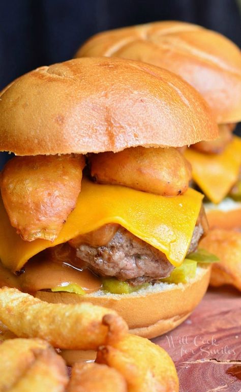 Onion Ring BBQ Cheeseburger. Fabulous juicy burger made with sharp cheddar cheese, mustard based bbq sauce, pickles and topped with delicious homemade onion wedges. | from willcookforsmiles.com Mustard Based Bbq Sauce, Will Cook For Smiles, Baked Onions, Onion Ring, Juicy Burger, Cheeseburger Recipe, Burger Dogs, Dipping Sauces Recipes, Burger Sliders