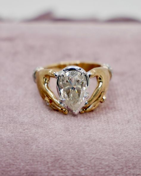 Our pear-shaped Moissanite Claddagh ring promises love, loyalty, and friendship with a sparkle that rivals the stars. 💍💖 . . . . . #claddaghring #antiquejewelry #uniquefinejewelry #jewelrytrends #explorepage #weddingwednesday #weddingjewellery #instajewelry #jewelrygram #jewelrylover #diamondobsessed #jewelryaddict #jewelryloversonly #aestheticjewelry #everydayjewelry #goldjewelry #ringsofinstagram #ringsoftheday #ringstack Vintage Claddagh Ring, Claddagh Ring Engagement, Claddagh Engagement Ring, Diamond Claddagh Ring, Claddagh Ring, Claddagh Rings, Ring Engagement, Everyday Jewelry, Jewelry Lover