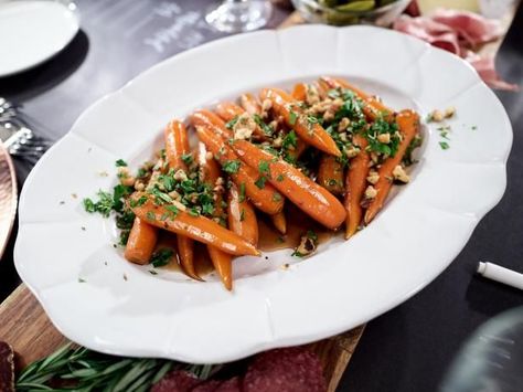 Get Smokey Candied Carrots with Walnut Gremolata Recipe from Food Network Giada's Holiday Handbook, Gremolata Recipe, Giada De Laurentiis Recipes, Maple Glazed Carrots, Candied Carrots, Giada Recipes, Glazed Carrots, Giada De Laurentiis, Vegetable Sides