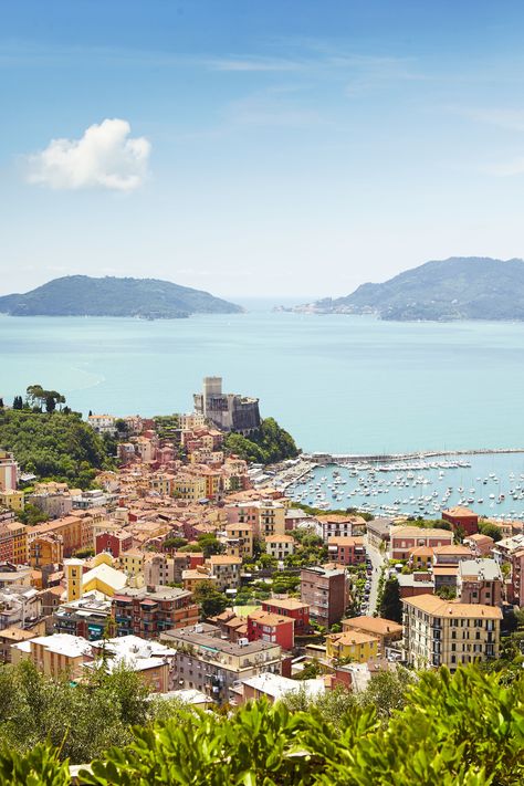 The town of Lerici, looking towards the marina and the 12th-century Castello di Lerici, which once controlled the entrance to the Gulf of La Spezia, Lunigiana, Italy // photo by Matt Munro #italy #lunigiana #lerici #sea Italian Vacation, Holiday Places, Romantic Destinations, European Vacation, Romantic Places, Italy Photo, Visit Italy, Vacation Photos, Italy Vacation