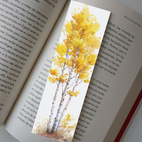 LAMINTAED BOOKMARK Capture the essence of the forest with this beautifully crafted Quaking Aspen Tree bookmark. The vibrant yellow hues and intricate details of the aspen leaves, hand-painted in watercolor, evoke the calm and beauty of a crisp fall day. Ideal for those who cherish the serene moments spent amongst the rustling leaves, this bookmark is a wonderful companion for your readings. Handmade Stationary Each item features a high-quality print of the original watercolor artwork. SIZE 2 X 6 Inches --------------------------------------------------------- IMPORTANT Shipping Details: We ship out orders on the same day or the next. Orders received during weekends will be sent out on the next working day. Please Be Aware: Orders not sent Priority mail are all sent as 1st class mail, and w Aspen Tree Watercolor, Fall Watercolor Bookmarks, Diy Bookmarks Watercolor, Watercolor Bookmarks Ideas, Quaking Aspen Tree, Watercolor Birch Trees, Tree Bookmark, Fall Bookmarks, Bookmark Cards