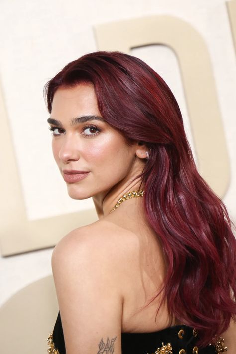 Dua Lipa’s New Red Hair Took More Than 10 Hours to Achieve — Interview | Allure Cherry Cola Hair Color, Red Hair Celebrities, Cherry Cola Hair, Cherry Red Hair, Wine Red Hair, Red Hair Inspo, Wine Hair, Skai Jackson, Cherry Hair