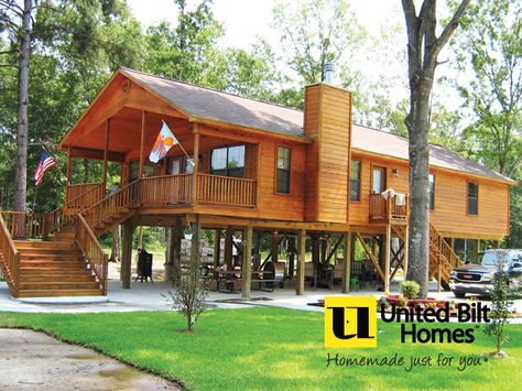 Cabin built on piling foundation Cabin On Stilts House Plans, House Plans On Stilts, Homes On Stilts, United Built Homes, River House Plans, Elevated House Design, Stilt House Plans, Cabin On Stilts, House On Stilt