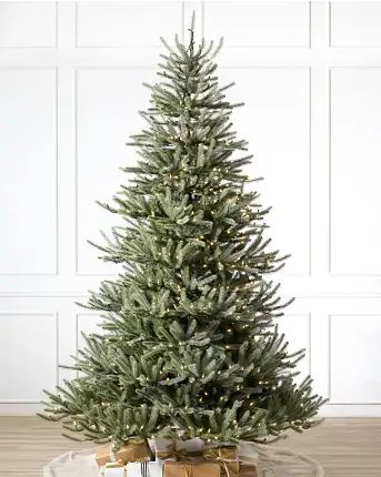 Delight guests with a festive display of your favorite ornaments. This lifelike tree is sparse by design, providing plenty of room for your collection of Christmas balls, figurines, and finials. Choose the unlit version for more decorating possibilities or go pre-lit with Candlelight® clear LED lights for extra sparkle. | Sanibel Spruce Tree Balsam Hill Christmas Tree, Best Artificial Christmas Trees, Realistic Artificial Christmas Trees, Christmas Tree Green, Spruce Christmas Tree, Xmas Wishlist, Christmas Tree Sale, Fir Christmas Tree, Prelit Tree