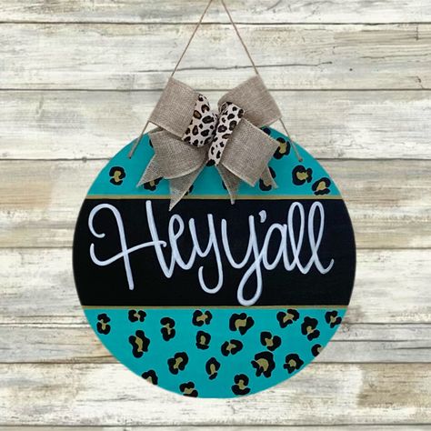 Handmade Hey Y’all Leopard Print Door Sign Hand Painted In Teal Blue With Gold And Black Leopard Print Burlap Wired Ribbon Bow Twine Hanger 12” Diameter New Circle Door Hanger, Tweety Bird Drawing, Painted Door Hangers, Charger Plate Crafts, Custom Door Hangers, Tin Wall Decor, Door Hangers Diy, Upcycled Gifts, Door Signs Diy