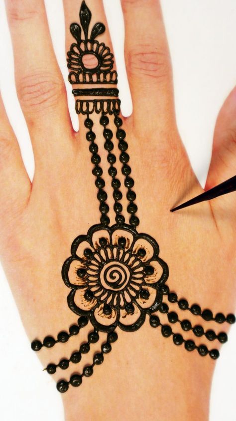 Very stylish mehndi design for Karwachauth and Eid festivals. New latest back hand mehndi design for wedding and every occasions. #mehndidesign #mehndi #backhandmehndi #jewellerymehndi #karwachauthmehndidesign #eidmehndi Mehndi Back Design, Latest Arabic Mehndi Designs Front Hand, Mehndi Design Bride, Back Hand Mehndi Designs Stylish, Mehandi Designs For Kids, Mehandi Design Simple, Style Mehndi Design, Simple Henna Designs Hand, Mehndi Design For Back Hand