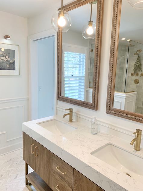 Modern cottage style colonial bathroom renovation Colonial Bathroom, Modern Cottage Style, Brass Fixtures, Modern Cottage, Marble Tile, Wainscoting, Bathroom Renovation, Cottage Style, Interior Spaces