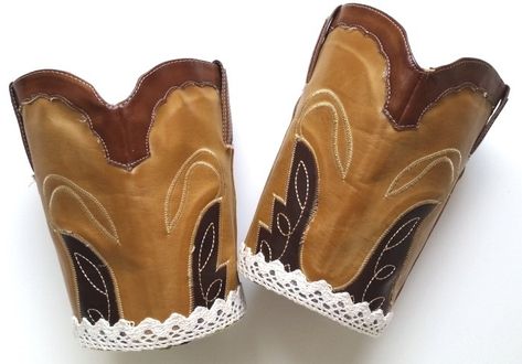 I refashioned a pair of cowboy boots awhile ago and held on to the chopped tops as I knew I'd find a use for them eventually!I finally had a DIY diva brainstorm and came up with a quick and quirky project for those chopped boot tops: Here’s how to create your own upcycled boot top baskets - these are fab for plants, storage and as funky gifts too! Grab a couple of chopped boot tops, some coordinating scrap fabric, a cardboard circle that fits into the boot top bottom and a glue gu… Diy Cowboy Boots Crafts, Cowboy Boot Crafts, Old Cowboy Boots, Funky Gifts, Old Boots, Scrap Fabric, Fabric Glue, Ribbon Trim, Girls Boots