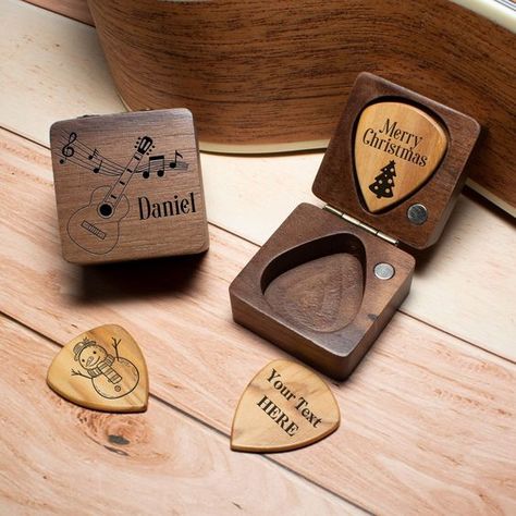 Price-to-cost looks good. It wouldn't be a waste if you put it on comfortably. Gifts For Guitar Lovers, Guitar Gifts For Him, Christmas Gifts For Music Lovers, Custom Guitar Pick, Gifts For Musicians, Wood Guitar Pick, Guitar Pick Holder, Gifts For Music Lovers, Guitarist Gifts