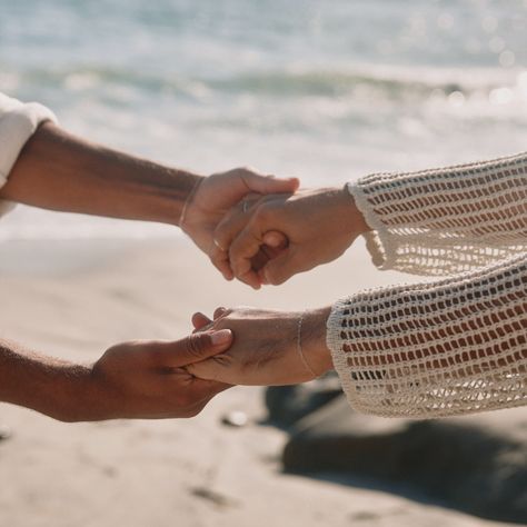 permanent jewelry, silver bracelet, rings, crochet long sleeve, linen blouse, beach couple photoshoot inspo, summer vibe Jewelry Photoshoot, Couple Jewelry, Couple Bracelets