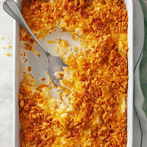 Funeral potatoes are an easy hash brown casserole. Our recipe features cheesy potatoes with a cornflake topping for a crispy, crunchy finish. Potatoe Casserole With Cornflakes, Potato Casserole With Corn Flakes, Cheesy Potatoes Corn Flakes, Cheesy Corn Flake Potato Casserole, Cabbage Casserole With Corn Flakes, Au Gratin Potatoes Easy, Hashbrown Casserole Easy, Best Potato Recipes, Potluck Ideas