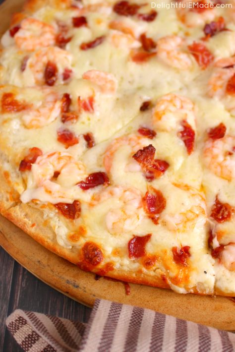 The ultimate pizza for Alfredo lovers!  Loaded with tender shrimp, crisp bacon and lots of cheese, this pizza is the perfect way to enjoy all your favorite flavors on one delicious slice! Shrimp Alfredo Pizza Recipe, Alfredo Pizza Recipe, Bacon Alfredo, Baked Egg Cups, Bacon Corn Chowder, Oatmeal Bars Recipes, Breakfast Bars Recipe, Stuffed French Toast Cream Cheese, Blueberry Crumble Bars