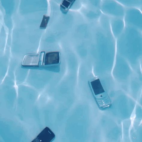 New trending GIF on Giphy Frutiger Aero Gif, Cybercore Gif, Swimming Pool Aesthetic, Phone Gif, Water Gif, Iphone Technology, Nokia 3310, Gif Art, Frutiger Aero