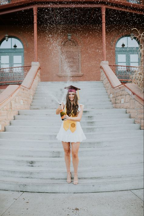 Senior graduation photo spraying champagne to celebrate!  #graduation #graduationpictures #champagne #celebration #party #grad #seniorportraits #seniorphotos Champagne Spray, Masters Graduation Pictures, Nursing School Graduation Pictures, College Grad Pictures, Champagne Celebration, Grad Picture Ideas, Nursing Graduation Pictures, College Graduation Pictures Poses, College Graduation Photoshoot