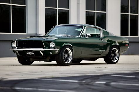 This is a 1968 Mustang GT 2+2 Fastback Cobra Jet in Highland Green Metallic. It has Black Nappa leather interior. This car has 17x9.5 painted charcoal American Racing Torq Thrust VN215 wheels. It features a 710hp Ford/Roush Gen 3 5.0L Ti-VCT Supercharged V8 engine and a Tremec T-56XL 6-speed manual transmission. #mustang #shelby #classicmustang #classicshelby #carinspiration #green #classiccar